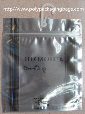 注文のプラスチック ホックは下着、衣服のためのハンガーが付いている帯電防止ポリ袋を袋に入れます